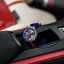 Strieborné pánske hodinky Bomberg Watches s gumovým pásikom RACING CARBON ST 45MM