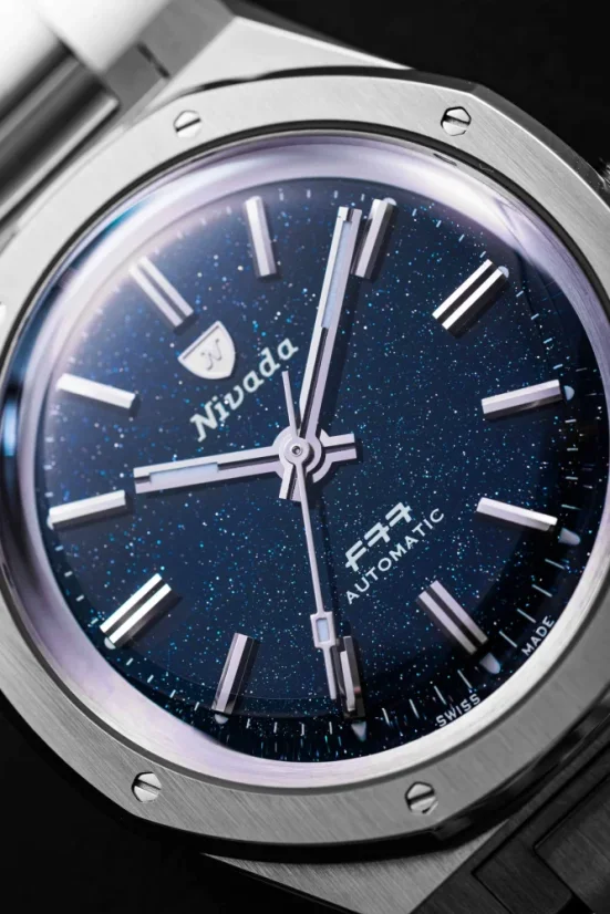 Strieborné pánske hodinky Nivada Grenchen s textilným opaskom F77 STAINLESS STEEL DARK BLUE 68010A77-BC 37MM Automatic