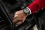 Černé pánské hodinky Bomberg s gumovým páskem Racing HOCKENHEIM 45MM