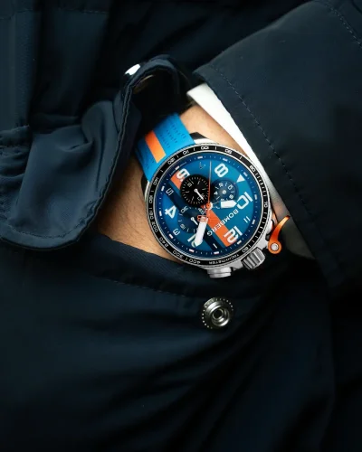 Men's silver Bomberg Watch with rubber strap RACING 4.2 Blue / Orange 45MM